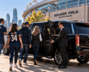 Milwaukee to Soldier Field limo service with a black luxury SUV and professional chauffeur preparing Wisconsin Bears fans for a Chicago game-day ride.