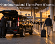 O'Hare international flights from Wisconsin, with a black Cadillac Escalade and chauffeur unloading suitcases at an international terminal curb at sunset